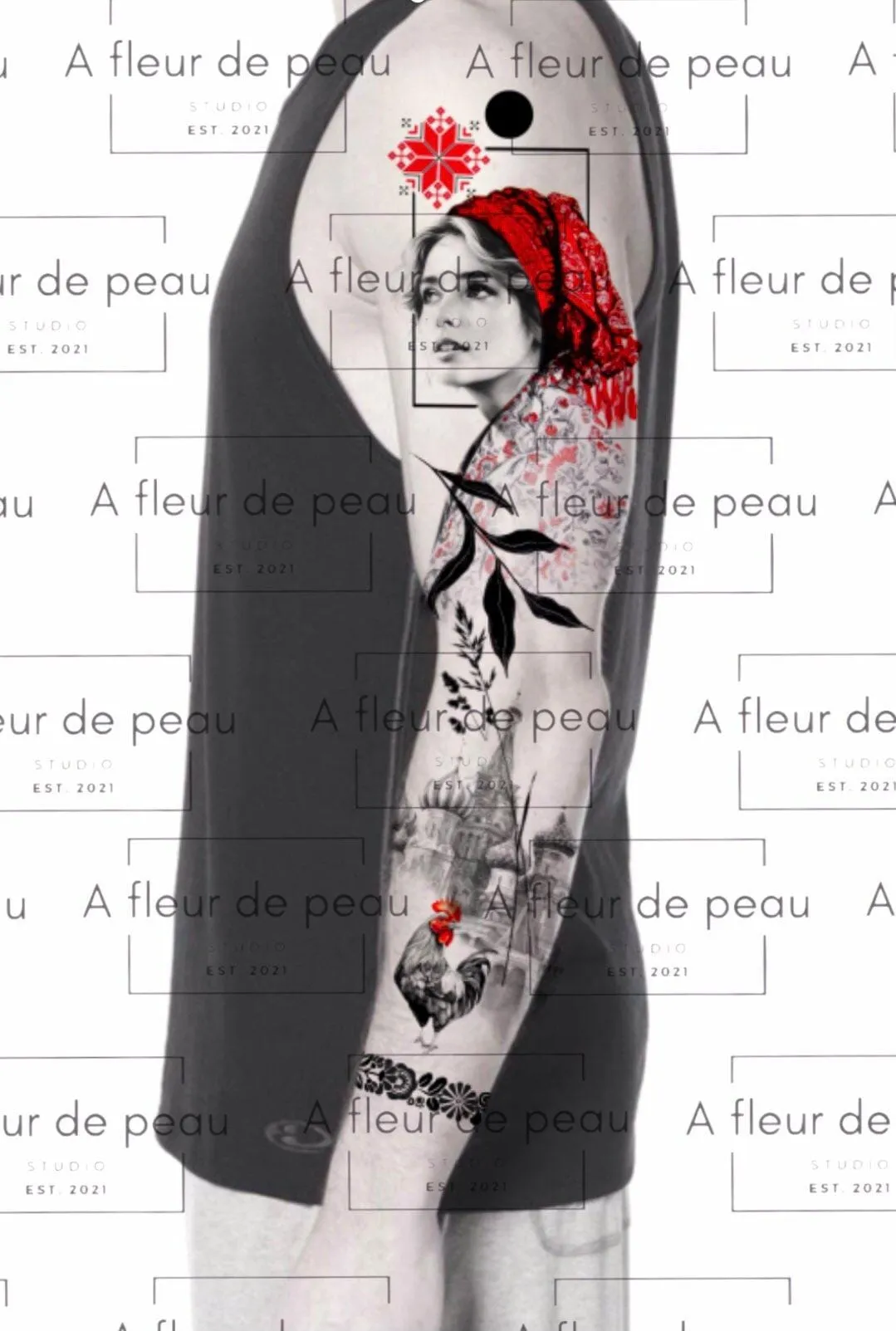 A Fleur de Peau - Professionelles Tattoo Studio - Vogel-Tattoo auf dem Arm einer Person